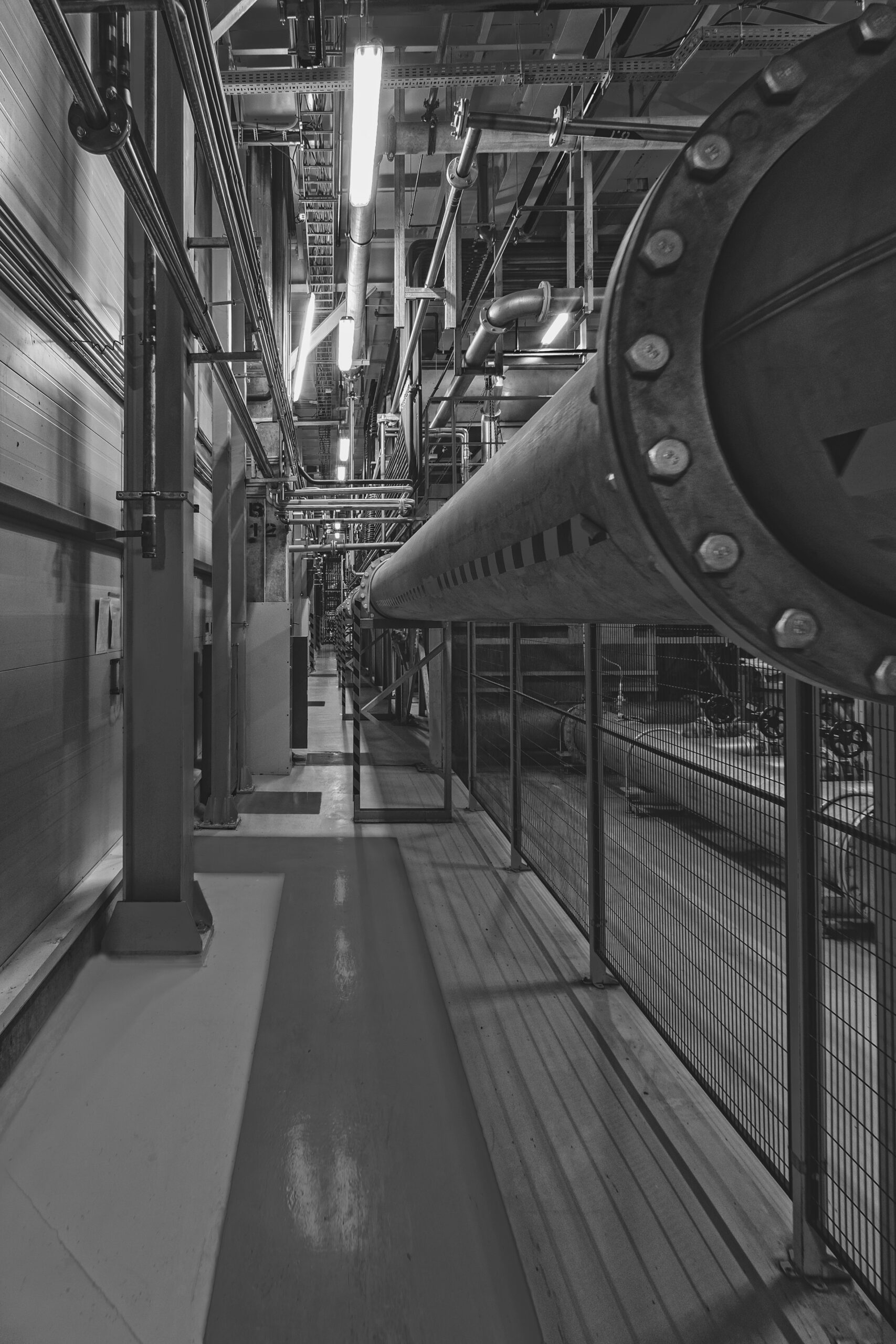 large industrial pipes inside automobile plant